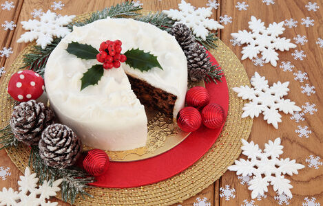Christmas,Food,Still,Life,With,Iced,Fruit,Cake,,Holly,,Snow